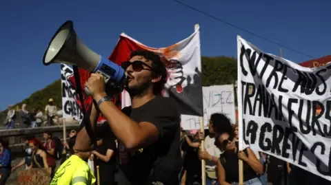Nationwide Protests Begin In Response to Spending Reductions